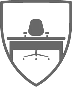Office desk and chair inside a shield.